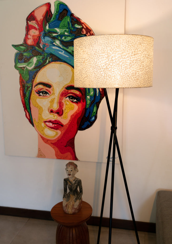 Decorative Floor Lamp with Shade (Ø55cm) "Wangi White Tripod" standing in a Bali villa next to a colorful painting