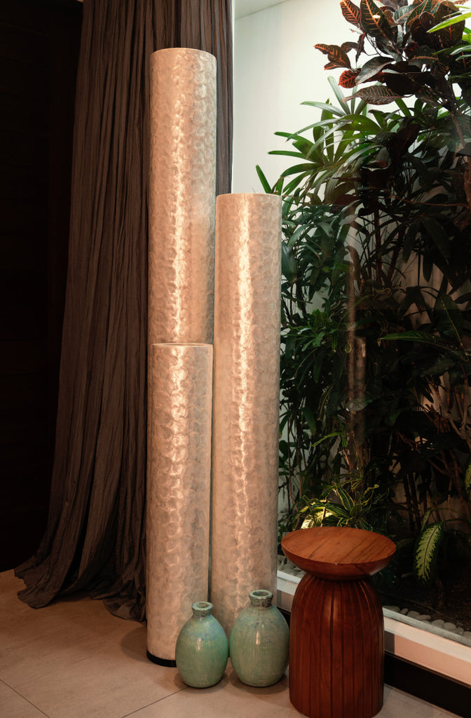 handcrafted decorative Cylinder Full Shell designer floor lamps standing in a corner of a living room