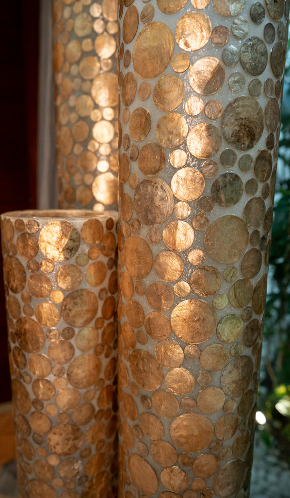Handcrafted decorative Cylinder Gold Coin designer floor lamp set in Singapore. Details of the Gold Coin design can be seen on this picture.