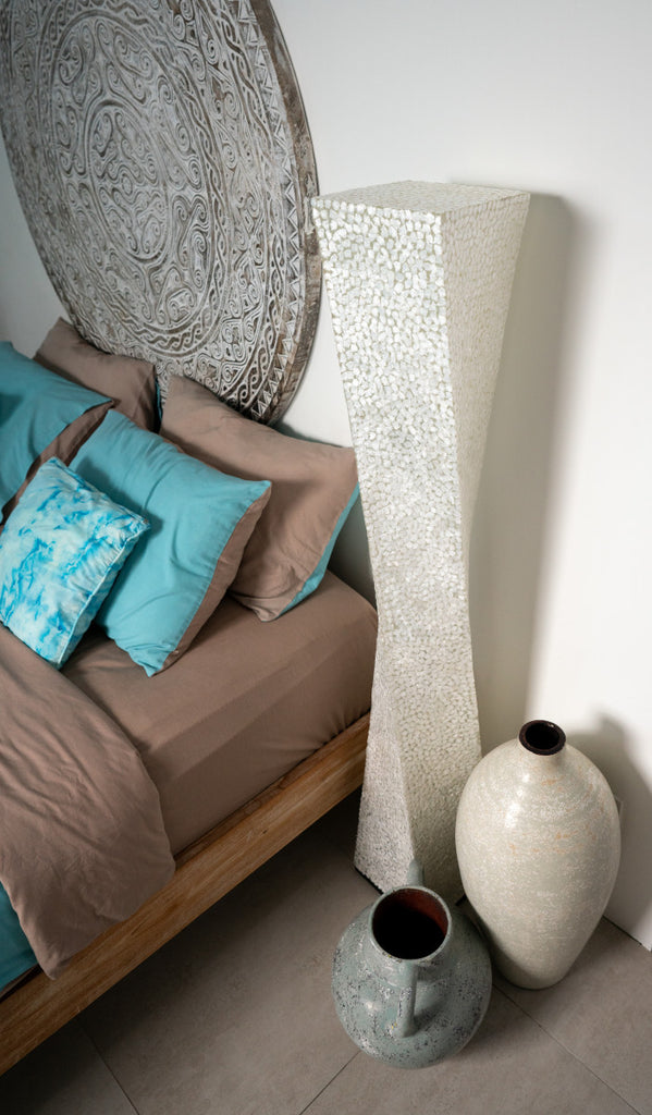 Decorative large floor lamp Wangi White Twisty in a bedroom that is used as a bedside lamp. Light House Design: Lighting to complement your home decor or interior design.